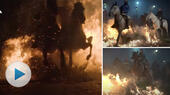 Hästar rids genom öppen eld för att renas